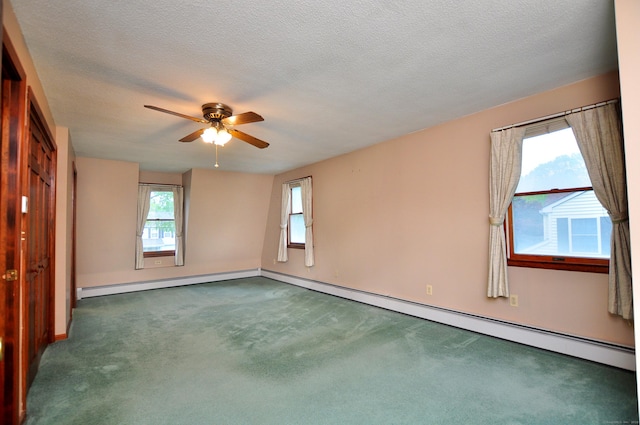 24 Jennifer Rd, Bristol, CT 06010 - carpeted spare room with a baseboard heating unit, a ceiling fan, baseboards, and a textured ceiling