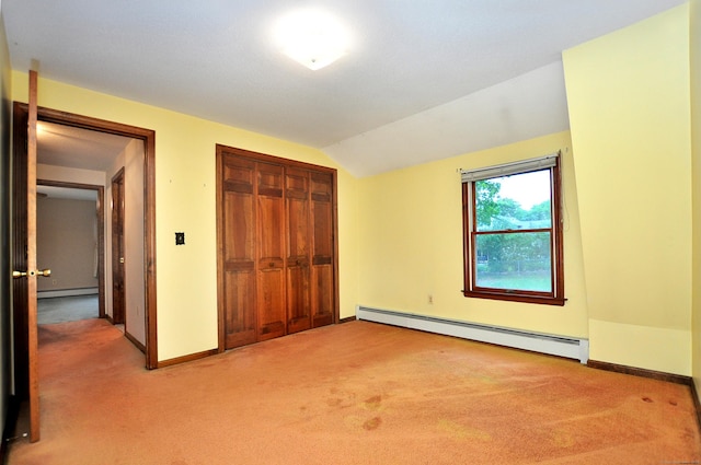 24 Jennifer Rd, Bristol, CT 06010 - unfurnished bedroom featuring a baseboard heating unit, light colored carpet, a baseboard radiator, a closet, and vaulted ceiling