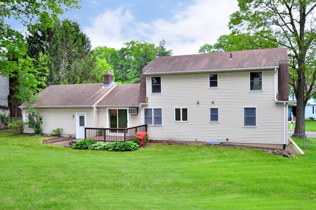 24 Jennifer Rd, Bristol, CT 06010 - back of property with a chimney, a wooden deck, and a lawn