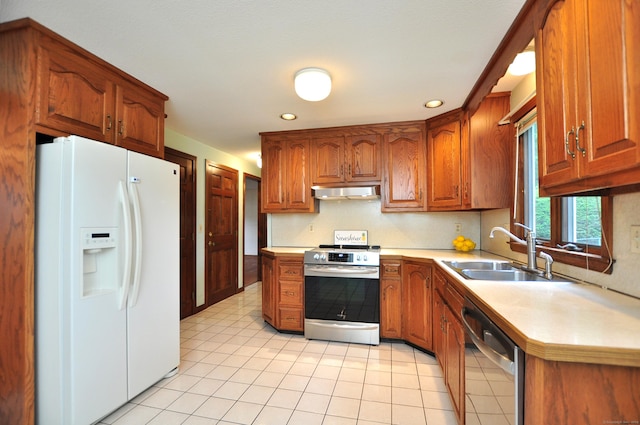 24 Jennifer Rd, Bristol, CT 06010 - kitchen featuring stainless steel appliances, under cabinet range hood, a sink, light countertops, and recessed lighting