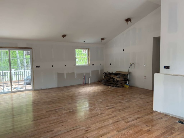 45 Logans Ln, Thompson, CT 06277 - unfurnished room featuring wood finished floors and vaulted ceiling