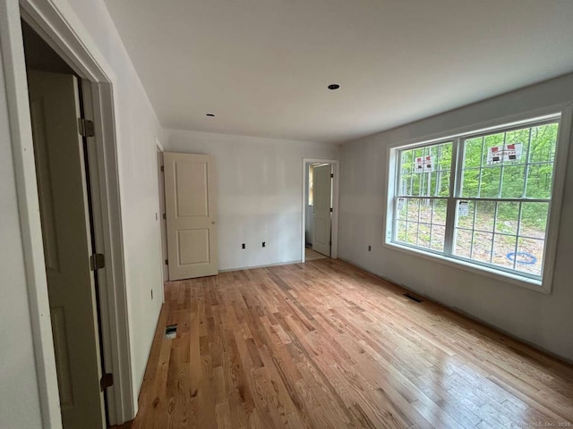45 Logans Ln, Thompson, CT 06277 - unfurnished bedroom with light wood-type flooring