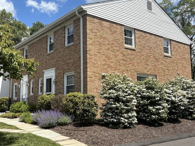 101 Heritage Hill Rd Unit 101, New Canaan, CT 06840 - view of side of home featuring brick siding