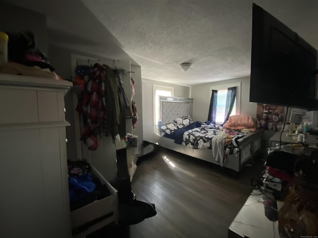 33 Oak St, Derby, CT 06418 - bedroom with a textured ceiling and wood finished floors