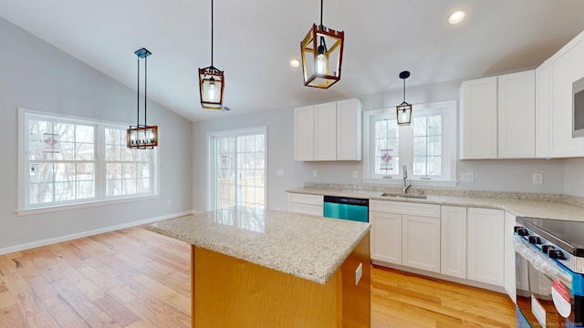 25 First Ave, Enfield, CT 06082 - kitchen featuring a sink, dishwasher, a kitchen island, electric stove, and light wood-type flooring