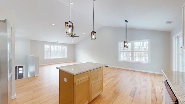 25 First Ave, Enfield, CT 06082 - kitchen featuring stainless steel dishwasher, ceiling fan, vaulted ceiling, light wood-style flooring, and open floor plan