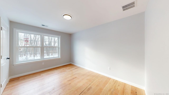 25 First Ave, Enfield, CT 06082 - spare room featuring wood finished floors and baseboards