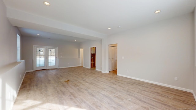 25 First Ave, Enfield, CT 06082 - unfurnished room with recessed lighting, baseboards, and light wood-style floors