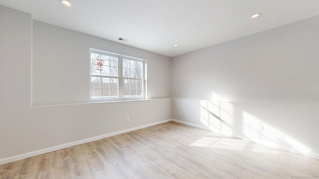 25 First Ave, Enfield, CT 06082 - spare room featuring wood finished floors, recessed lighting, and baseboards