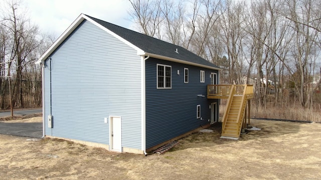 25 First Ave, Enfield, CT 06082 - view of side of home with stairway and a wooden deck