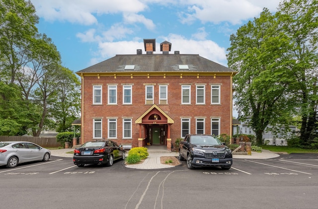 58 Woodley Ct Unit 14, Meriden, CT 06450 - view of building exterior featuring uncovered parking