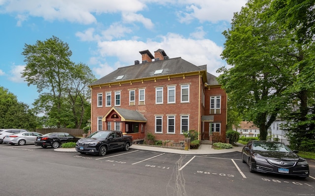 58 Woodley Ct Unit 14, Meriden, CT 06450 - view of building exterior featuring uncovered parking
