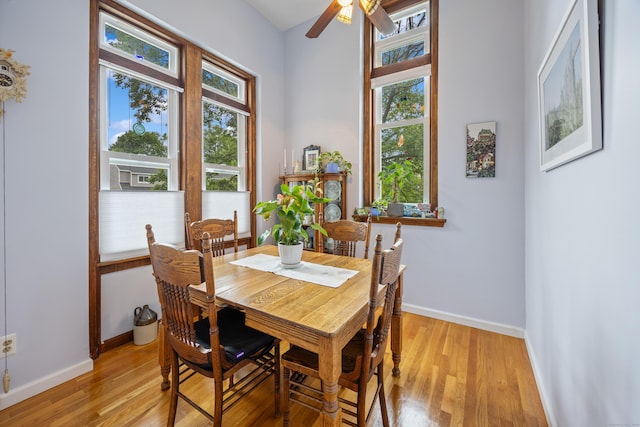 58 Woodley Ct Unit 14, Meriden, CT 06450 - dining area featuring baseboards, light wood-type flooring, and ceiling fan