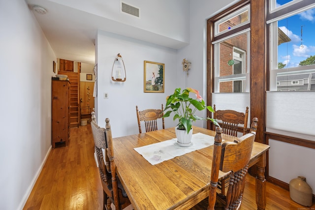 58 Woodley Ct Unit 14, Meriden, CT 06450 - dining room with light wood-style flooring and baseboards