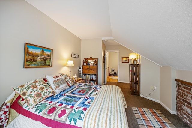 58 Woodley Ct Unit 14, Meriden, CT 06450 - carpeted bedroom featuring lofted ceiling and baseboards