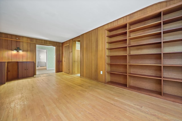 16 Katydid Ln, Weston, CT 06883 - empty room with wood walls and wood finished floors