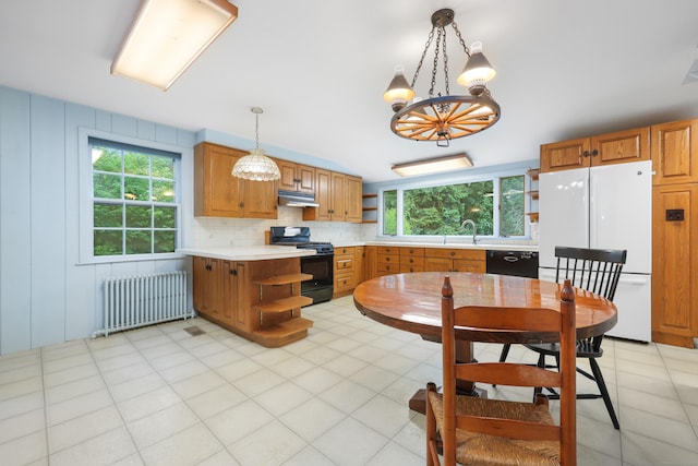 16 Katydid Ln, Weston, CT 06883 - kitchen with black appliances, radiator heating unit, open shelves, under cabinet range hood, and plenty of natural light