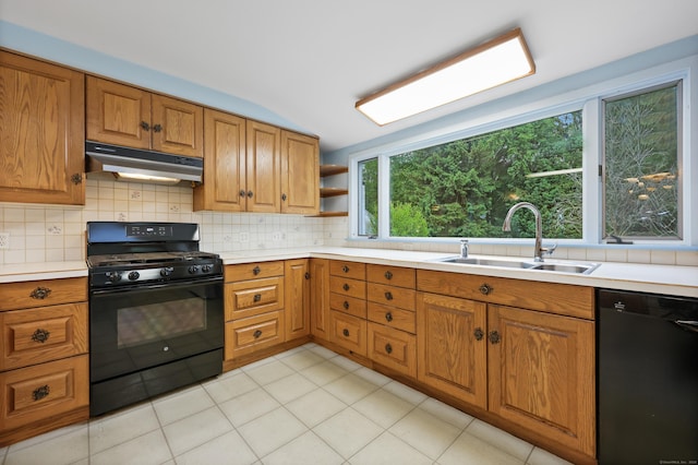 16 Katydid Ln, Weston, CT 06883 - kitchen with black appliances, under cabinet range hood, a sink, and brown cabinetry