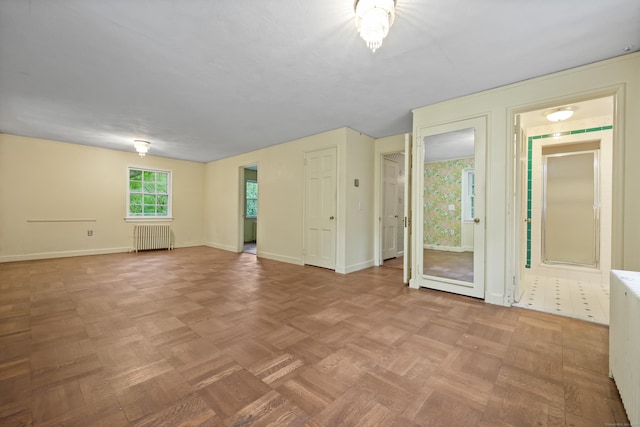 16 Katydid Ln, Weston, CT 06883 - empty room with radiator heating unit and baseboards