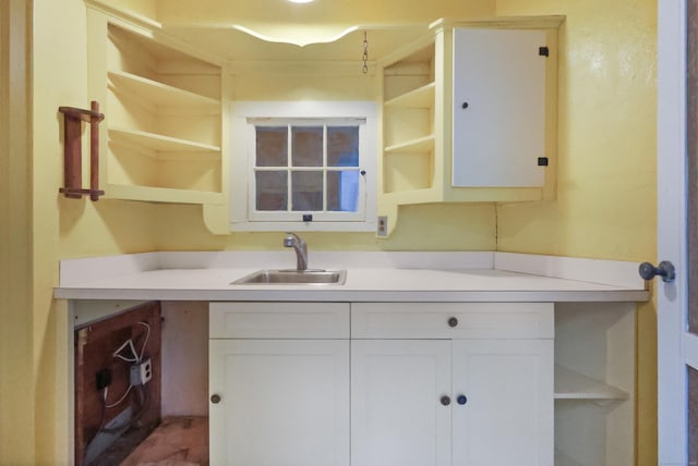 16 Katydid Ln, Weston, CT 06883 - kitchen featuring open shelves, a sink, and light countertops