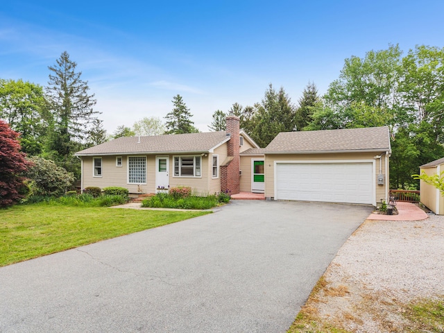 332 Shewville Rd, Ledyard, CT 06339 - single story home featuring a chimney, a front yard, and driveway