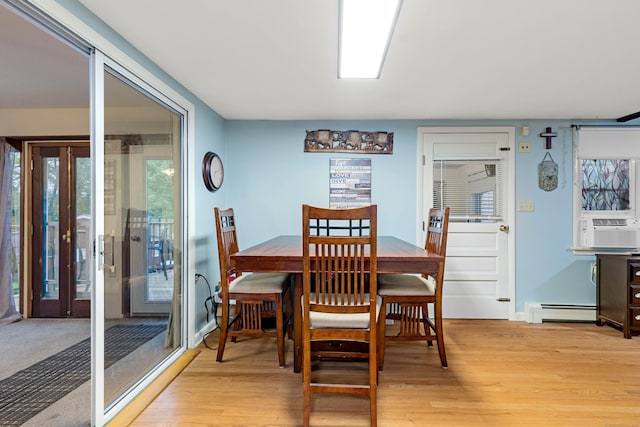 332 Shewville Rd, Ledyard, CT 06339 - dining area with baseboard heating, light wood-type flooring, and baseboards