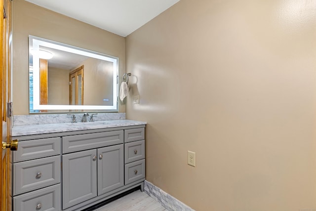 332 Shewville Rd, Ledyard, CT 06339 - bathroom featuring vanity, wood finished floors, and baseboards