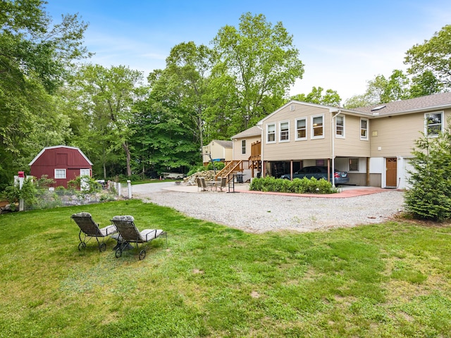 332 Shewville Rd, Ledyard, CT 06339 - rear view of property featuring a yard, a barn, and an outdoor structure