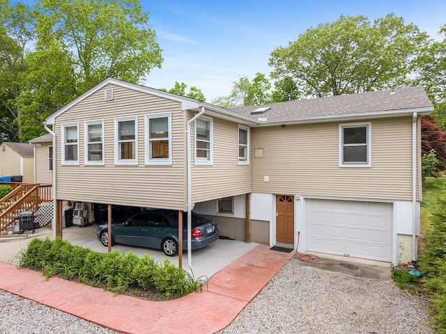 332 Shewville Rd, Ledyard, CT 06339 - view of front facade with an attached garage, driveway, and a shingled roof