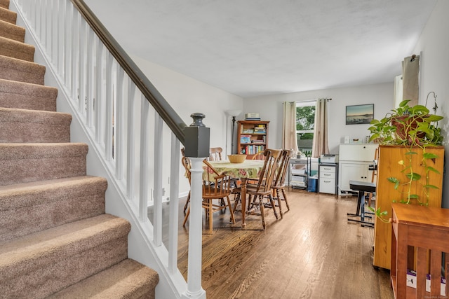 21 Pond Rd, Hamden, CT 06514 - dining space featuring wood finished floors and stairs