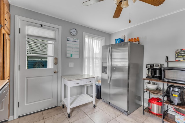21 Pond Rd, Hamden, CT 06514 - kitchen with stainless steel refrigerator with ice dispenser, a ceiling fan, light tile patterned flooring, and light countertops