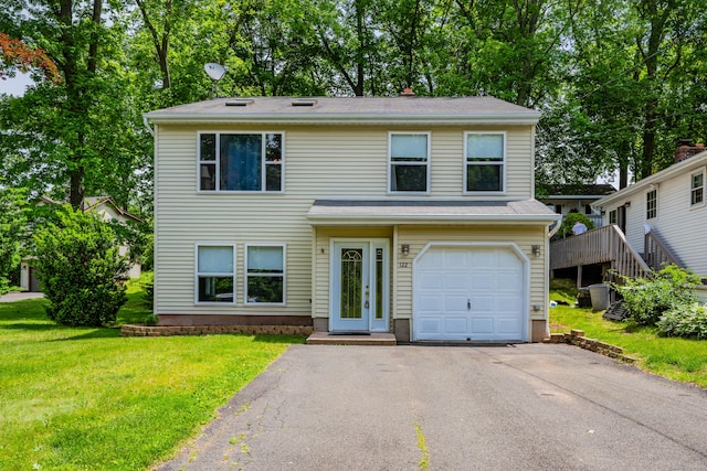 122 Carr Ave, Newington, CT 06111 - traditional-style home featuring a front yard, driveway, and an attached garage