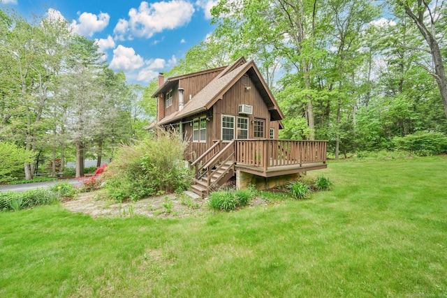 55 Indian Spring Rd, Woodstock, CT 06281 - rear view of property with a chimney, a yard, and a wooden deck