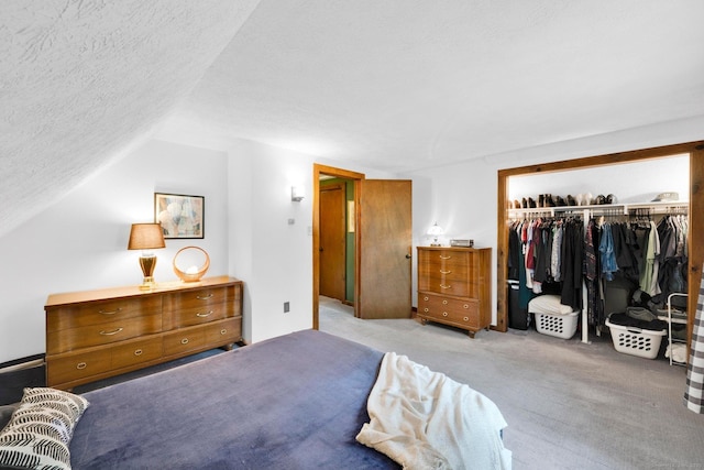55 Indian Spring Rd, Woodstock, CT 06281 - carpeted bedroom featuring a closet, a textured ceiling, and lofted ceiling