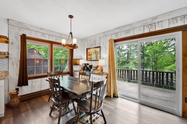 55 Indian Spring Rd, Woodstock, CT 06281 - dining room featuring hardwood / wood-style flooring, plenty of natural light, and a chandelier