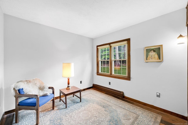 55 Indian Spring Rd, Woodstock, CT 06281 - sitting room featuring wood finished floors and baseboards