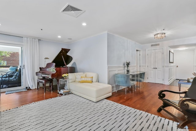 1633 Washington Blvd Unit 3A, Stamford, CT 06902 - living room featuring wood finished floors, crown molding, a wainscoted wall, a decorative wall, and recessed lighting