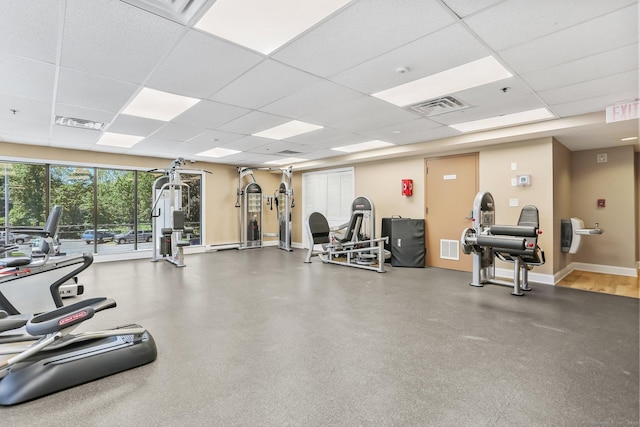 1633 Washington Blvd Unit 3A, Stamford, CT 06902 - workout area featuring a paneled ceiling and baseboards