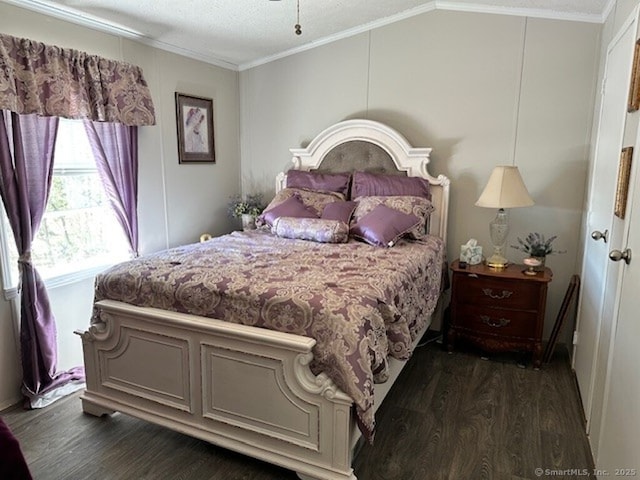 23 N Rd, Southington, CT 06489 - bedroom with dark wood-style flooring and ornamental molding