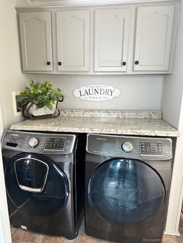 23 N Rd, Southington, CT 06489 - laundry area featuring washing machine and dryer and cabinet space