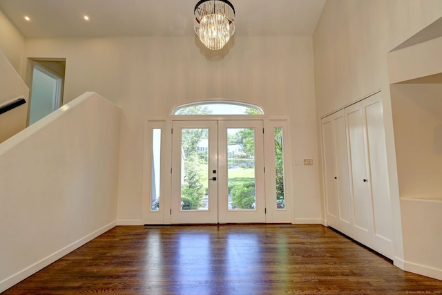 66 Penny Ln, Woodbridge, CT 06525 - entryway featuring a chandelier, wood finished floors, a high ceiling, baseboards, and recessed lighting