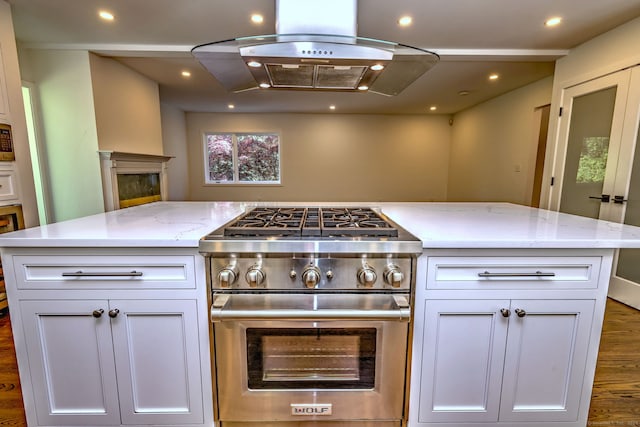 66 Penny Ln, Woodbridge, CT 06525 - kitchen with high end stove, island exhaust hood, wood finished floors, white cabinets, and light stone counters