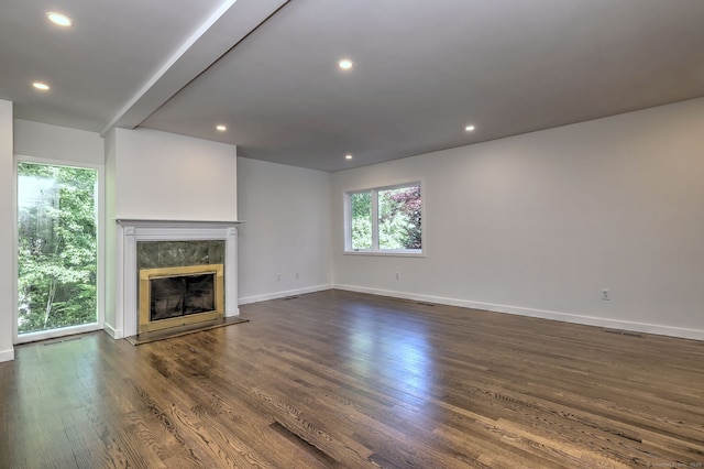 66 Penny Ln, Woodbridge, CT 06525 - unfurnished living room with a premium fireplace, baseboards, dark wood-type flooring, and recessed lighting
