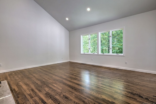 66 Penny Ln, Woodbridge, CT 06525 - spare room with vaulted ceiling, dark wood-style floors, recessed lighting, and baseboards