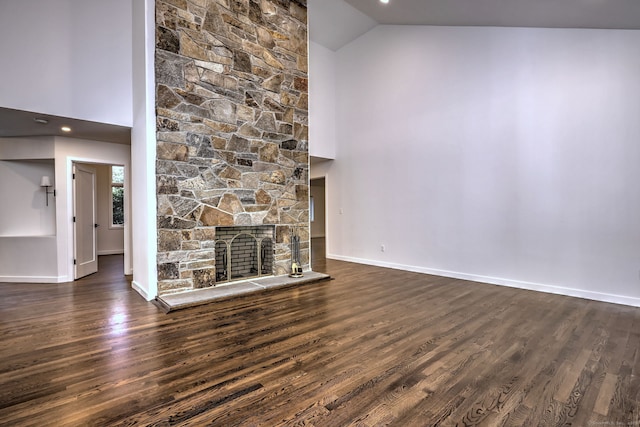 66 Penny Ln, Woodbridge, CT 06525 - unfurnished living room with high vaulted ceiling, dark wood finished floors, baseboards, and a stone fireplace