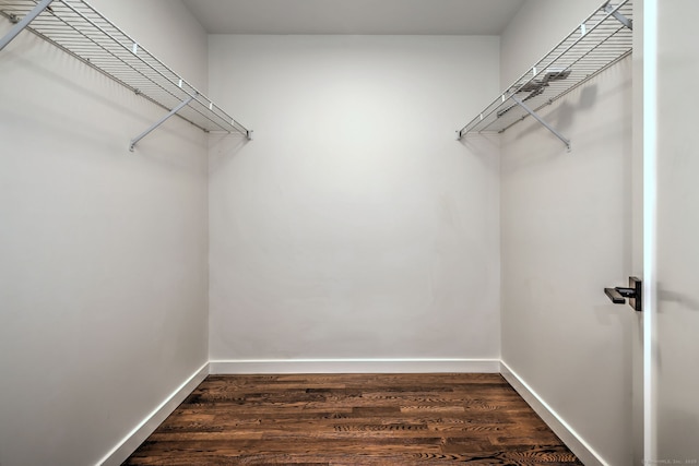 66 Penny Ln, Woodbridge, CT 06525 - walk in closet featuring dark wood finished floors