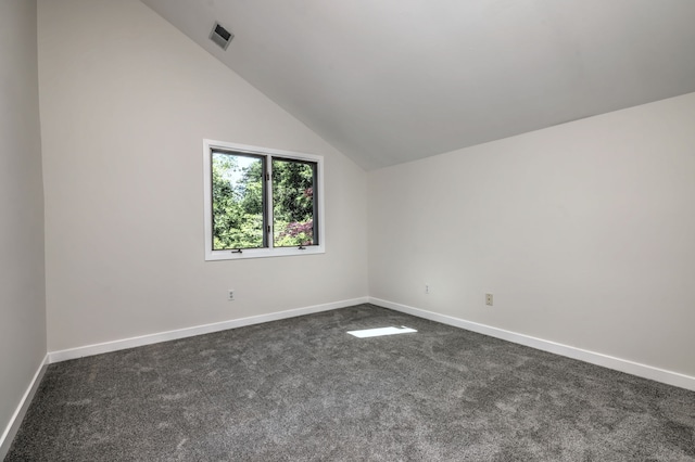 66 Penny Ln, Woodbridge, CT 06525 - additional living space featuring vaulted ceiling, dark carpet, and baseboards