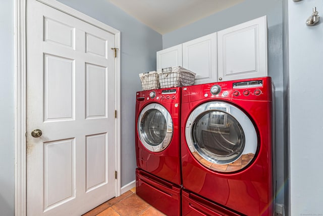 15 Brittany Dr, Durham, CT 06422 - washroom with washing machine and dryer, cabinet space, light tile patterned flooring, and baseboards