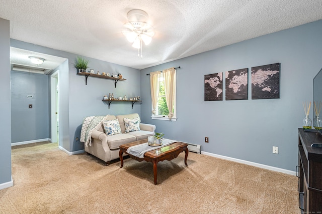 15 Brittany Dr, Durham, CT 06422 - carpeted living room featuring a textured ceiling, baseboards, and a ceiling fan