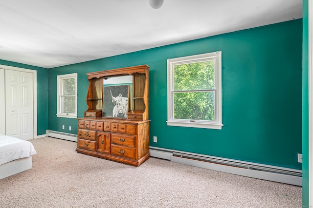 15 Brittany Dr, Durham, CT 06422 - carpeted bedroom featuring baseboard heating, a closet, and baseboards